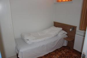 Voodi või voodid majutusasutuse Hotel Hirtshals toas