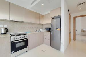 Kuchyň nebo kuchyňský kout v ubytování GreenFuture - A A Tower - One Bedroom