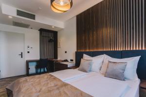 Rúm í herbergi á Hotel Batuda