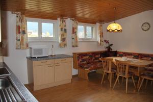 Kuchyňa alebo kuchynka v ubytovaní Gostanova Appartements + 28 fotografií