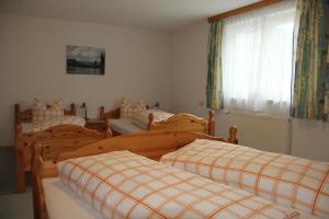 Posteľ alebo postele v izbe v ubytovaní Gostanova Appartements