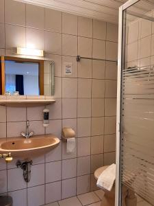 Koupelna v ubytování Hotel Gasthof Altmann