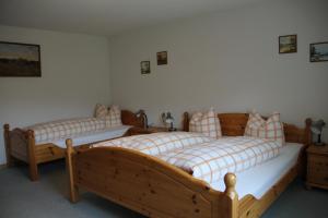 Posteľ alebo postele v izbe v ubytovaní Gostanova Appartements