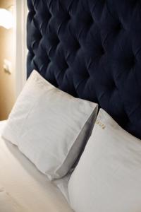 Postel nebo postele na pokoji v ubytování Private Rooms in Hotel GROFA 3 поверх