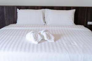Postel nebo postele na pokoji v ubytování JS HOTEL