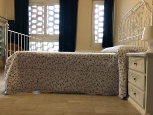 A bed or beds in a room at Poggio Savelli