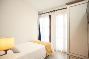 Posteľ alebo postele v izbe v ubytovaní Hotel Casa Palacio la Sal
