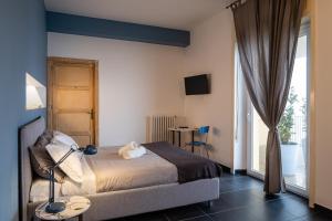 Postel nebo postele na pokoji v ubytování WelcHome - guest accomodation