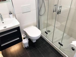 Bathroom sa Premiumferienwohnung-Koehnke-1