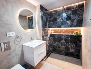 Koupelna v ubytování Apartamento Tamarán 105