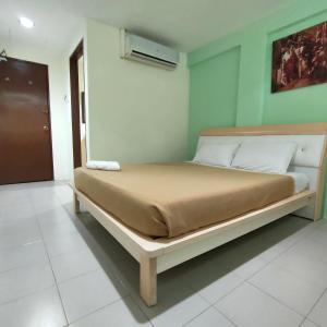 Postel nebo postele na pokoji v ubytování Best One Hotel