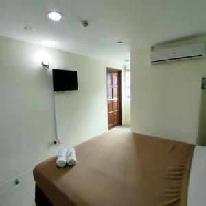 Postel nebo postele na pokoji v ubytování Best One Hotel