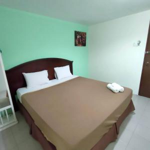 Postel nebo postele na pokoji v ubytování Best One Hotel