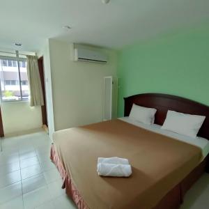Postel nebo postele na pokoji v ubytování Best One Hotel
