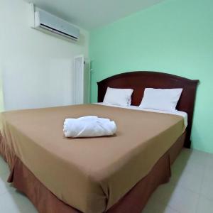 Postel nebo postele na pokoji v ubytování Best One Hotel