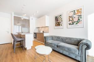 Kuchyňa alebo kuchynka v ubytovaní Wola Bloom Apartment