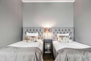 Postel nebo postele na pokoji v ubytování Best Western Ta Inn Hotel