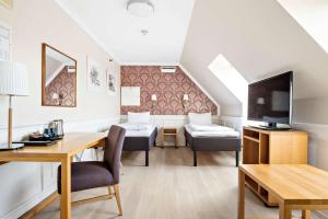 Postel nebo postele na pokoji v ubytování Best Western Plus Hotel Bakeriet + 37 fotografií