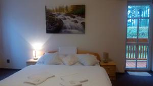 Posteľ alebo postele v izbe v ubytovaní Hotel Garni Belveder