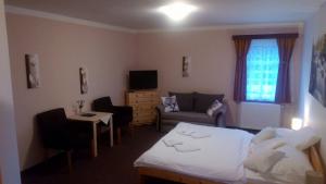 Posteľ alebo postele v izbe v ubytovaní Hotel Garni Belveder
