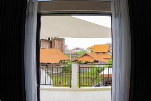 Balkón nebo terasa v ubytování Berawa Homestay