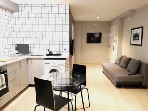Posedenie v ubytovaní Mazi Apartments Suite