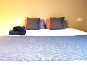 Posteľ alebo postele v izbe v ubytovaní Mazi Apartments Suite