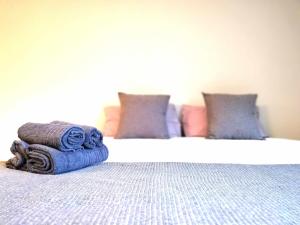 Posteľ alebo postele v izbe v ubytovaní Mazi Apartments Suite