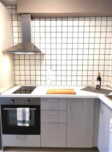 Kuchyňa alebo kuchynka v ubytovaní Mazi Apartments Suite
