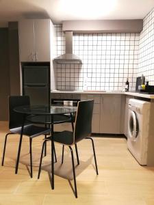 Kuchyňa alebo kuchynka v ubytovaní Mazi Apartments Suite