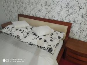 Posteľ alebo postele v izbe v ubytovaní Apartament przy Słonecznej
