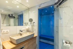 a bathroom with a sink and a shower at Haus Saskia in Sölden