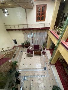 an overhead view of a living room in a building at Hotel Al Mansur in Bukhara