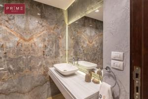 A bathroom at Prime Select West Sodic