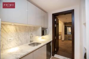 A kitchen or kitchenette at Prime Select West Sodic