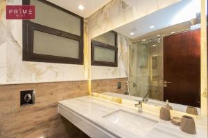 A bathroom at Prime Select West Sodic