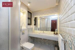 A bathroom at Prime Select West Sodic