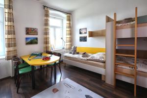 Postel nebo postele na pokoji v ubytování Apartmány U Aloise
