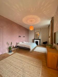 Postel nebo postele na pokoji v ubytování La Maison Jolimont