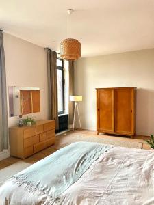 Postel nebo postele na pokoji v ubytování La Maison Jolimont