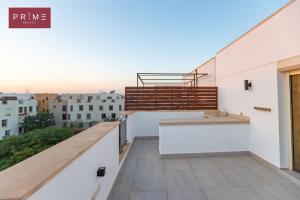 A balcony or terrace at Prime Select West Sodic