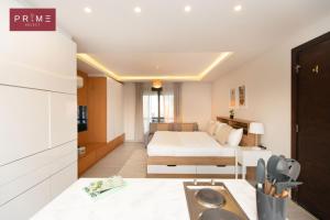 A bed or beds in a room at Prime Select West Sodic