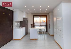 A kitchen or kitchenette at Prime Select West Sodic