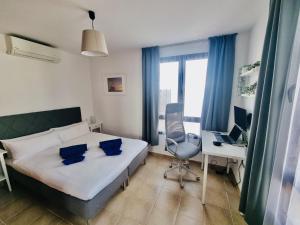 Postel nebo postele na pokoji v ubytování Casa Atlantida + 15 fotografií