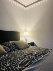 Posteľ alebo postele v izbe v ubytovaní Klebi’s apartmanház