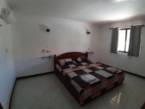 Postel nebo postele na pokoji v ubytování Homestay 1-2pax AC room 2 including private kitchen