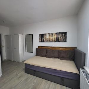 Ένα ή περισσότερα κρεβάτια σε δωμάτιο στο Ferienwohnung NR1