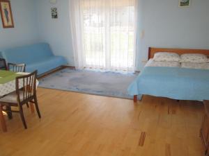 Posteľ alebo postele v izbe v ubytovaní Apartament Panorama Sniezka - Willawil