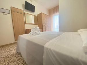 Postel nebo postele na pokoji v ubytování Hotel Ravello da Lorenzo e Moira Adults only