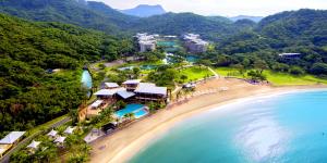 an aerial view of a beach with a resort at Condo Unit for Rent at Pico de Loro by Raquel's Place in Nasugbu